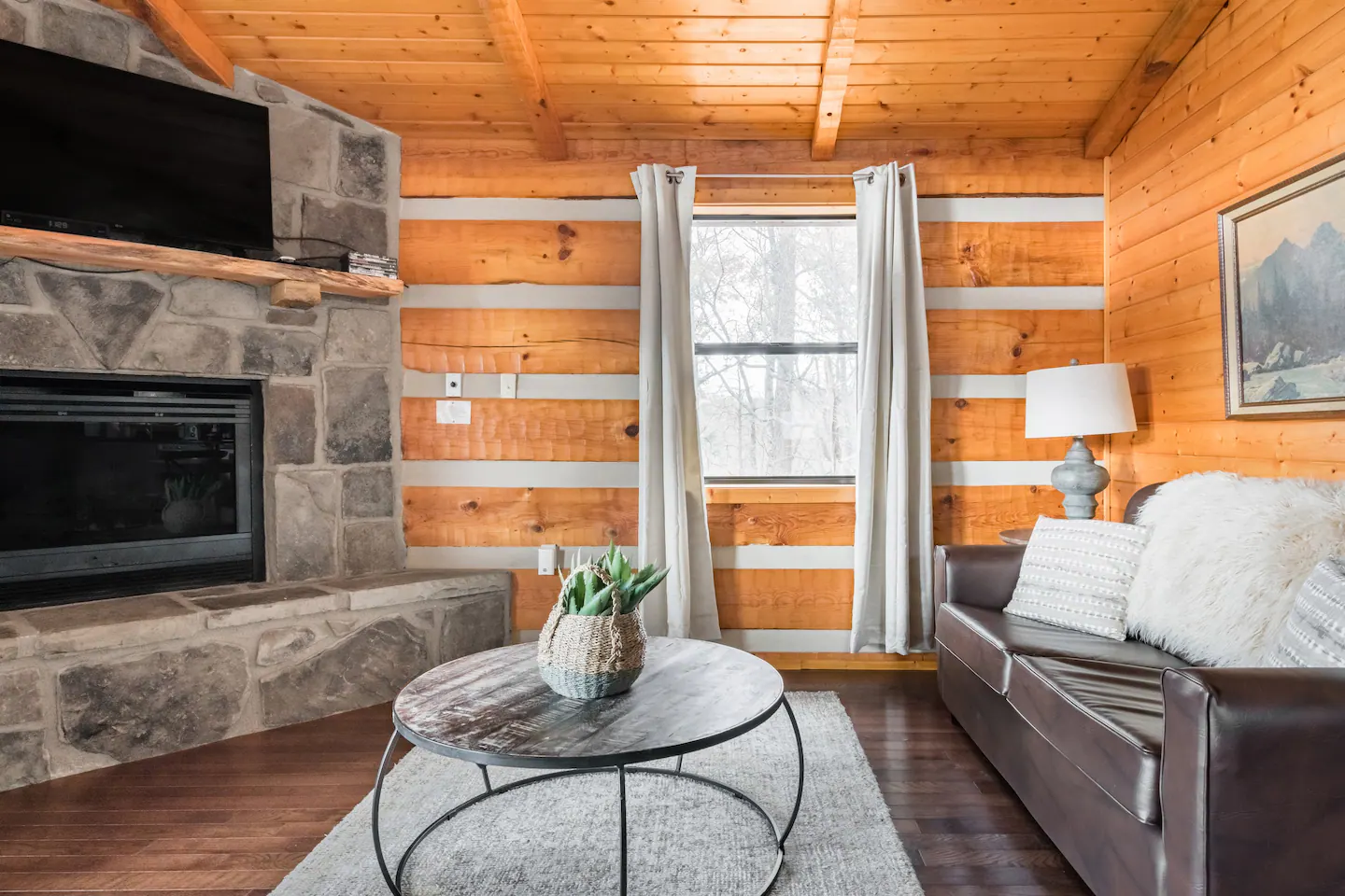 Gaze over the window while relaxing in that sofa and see that beautiful mountain view.