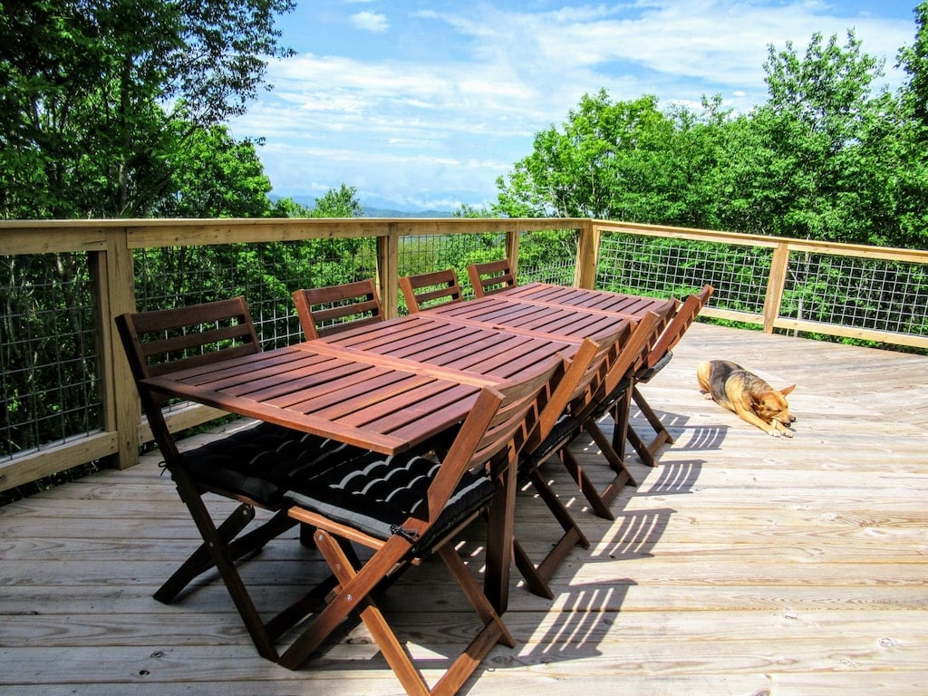 Outdoor dining with seats for everyone, even the dog!