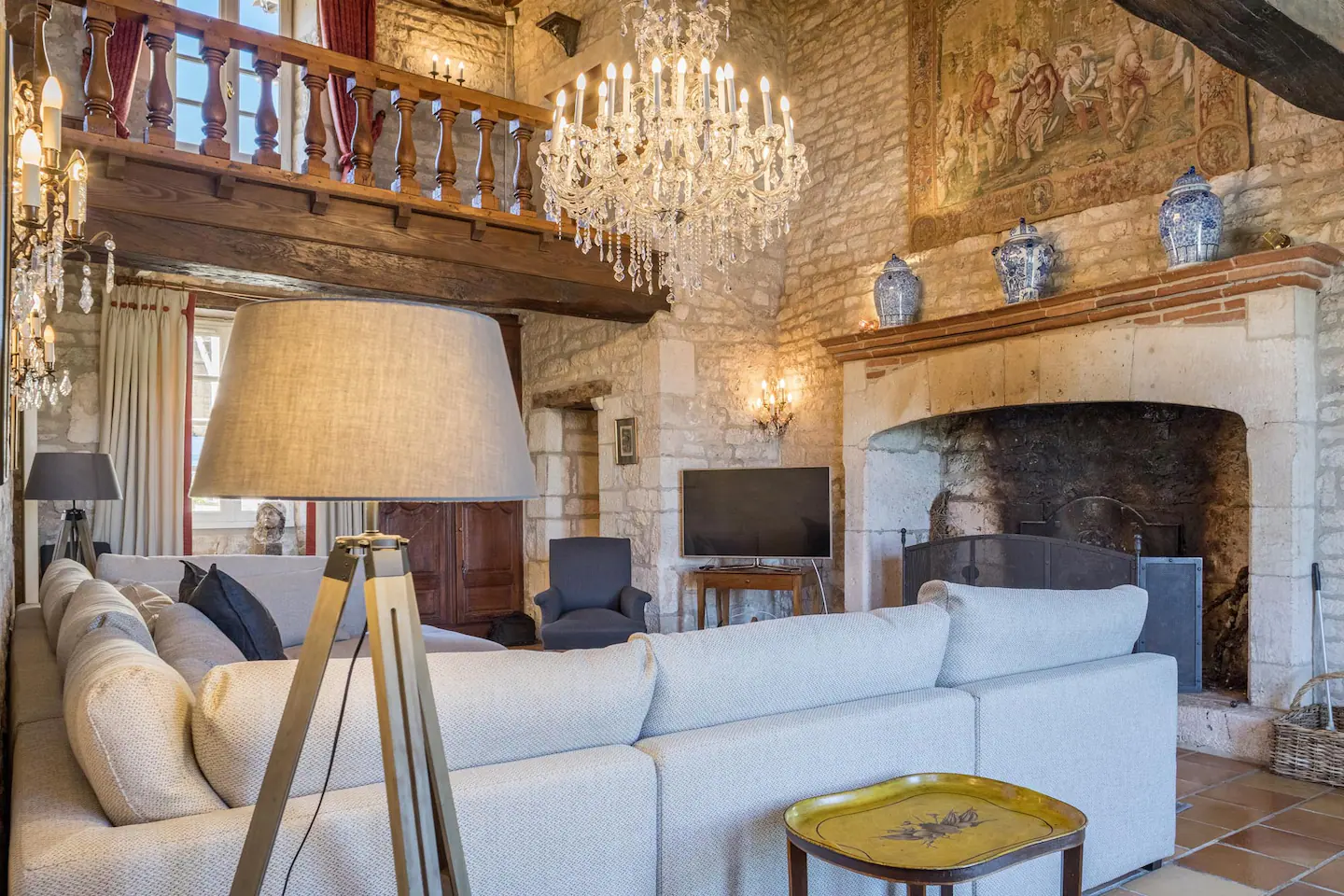 A huge antique fireplace in the living area
