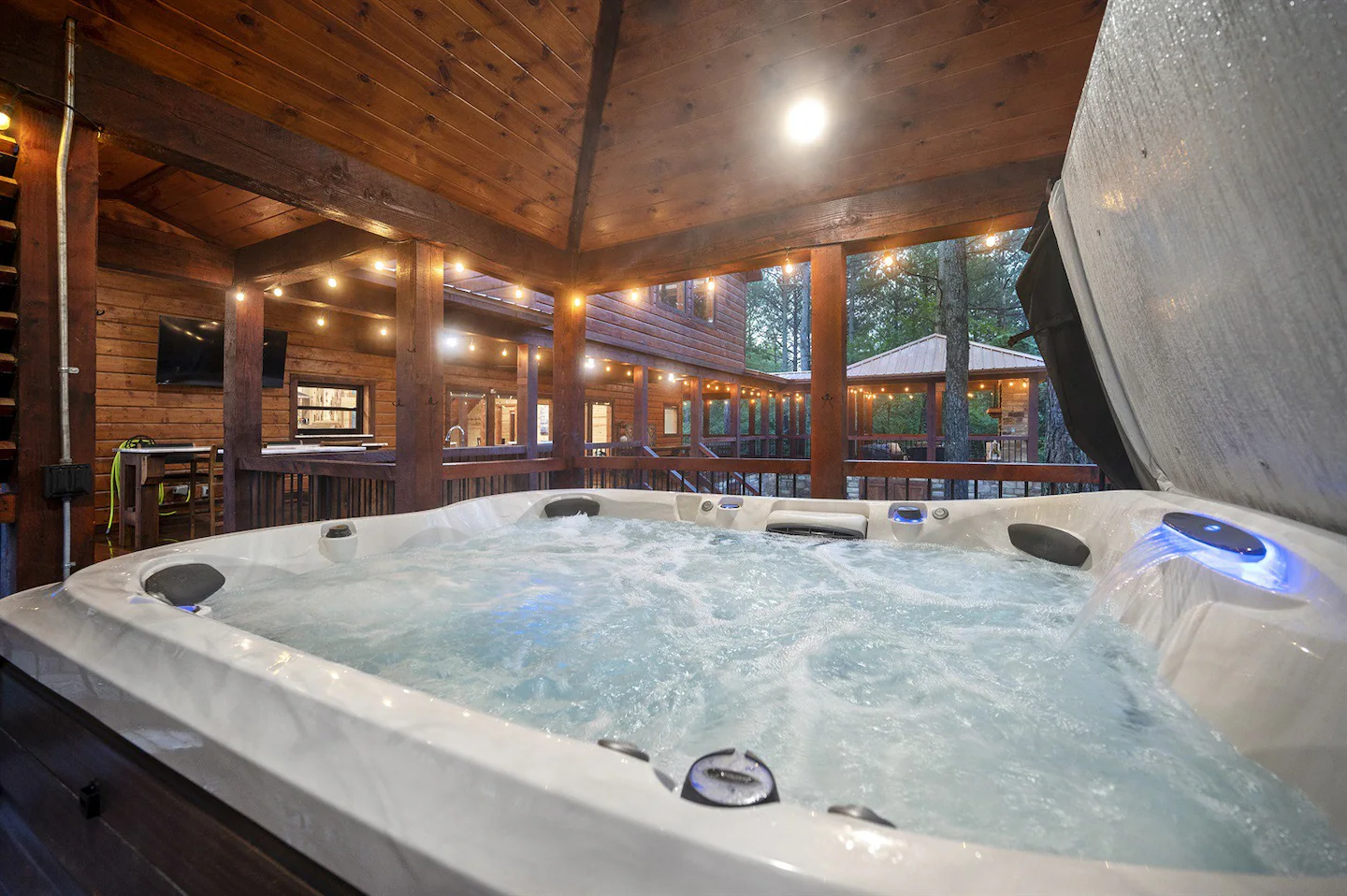 A spacious hot tub is located in its own dedicated area.