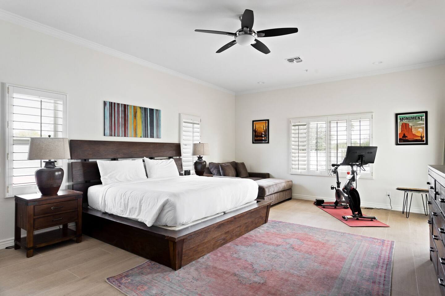 The main suite offers a king-size bed and even an exercise bike for your fitness needs.