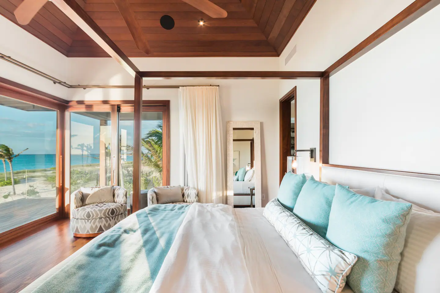 Ensuite bathroom with rain shower and a king-size bed