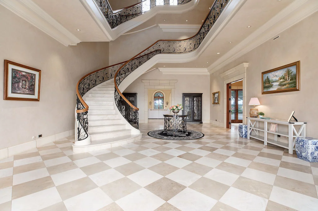 Inside, you'll find marbled stairs leading to the upper floor