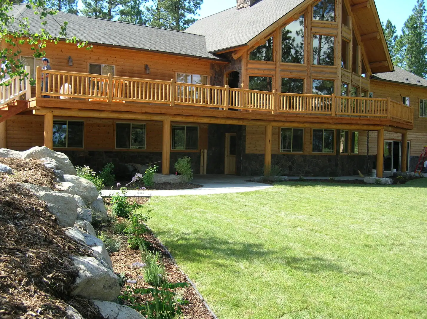 Sunken front lawn ideal for hosting gatherings.