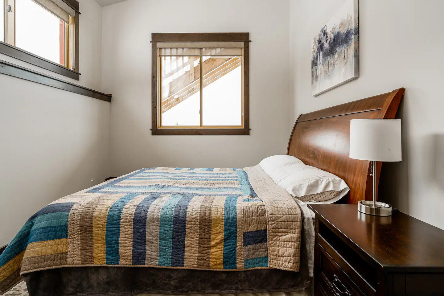 The bed is a queen-sized bed.