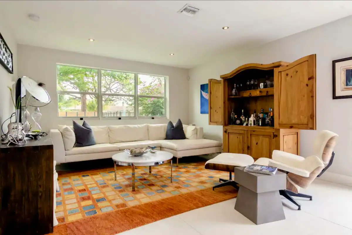 Stylish and comfortable Eames lounge chair to relax in or read a great book, conveniently close to the bar.