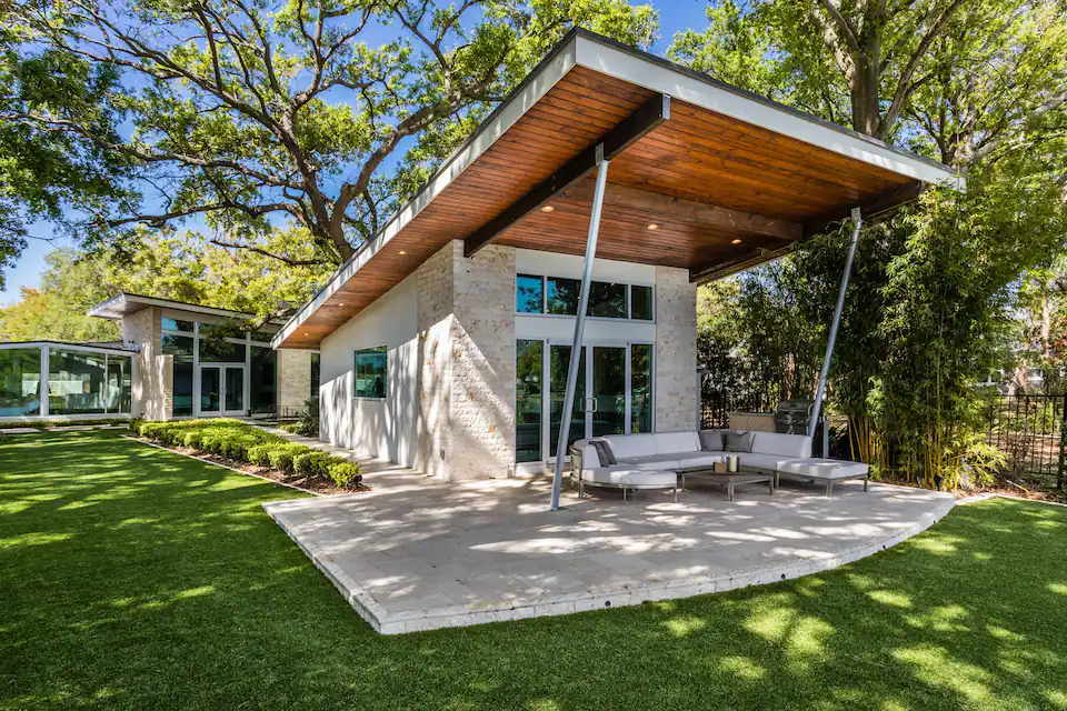This is an Urban Oasis in one of the Hottest Neighborhoods in Town! Owners Live on Property in Main House which is pictured here behind The Kiwi Cabana.
